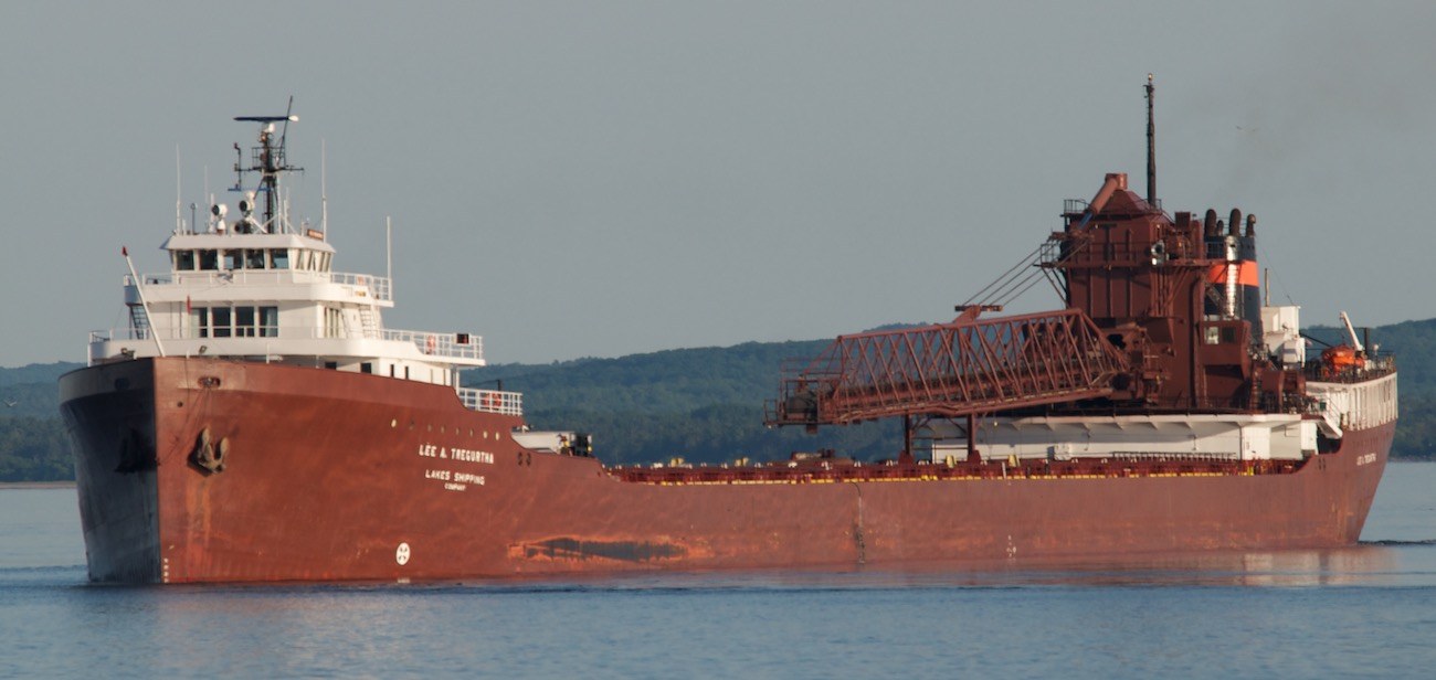 Bulk ore carrier loading at port